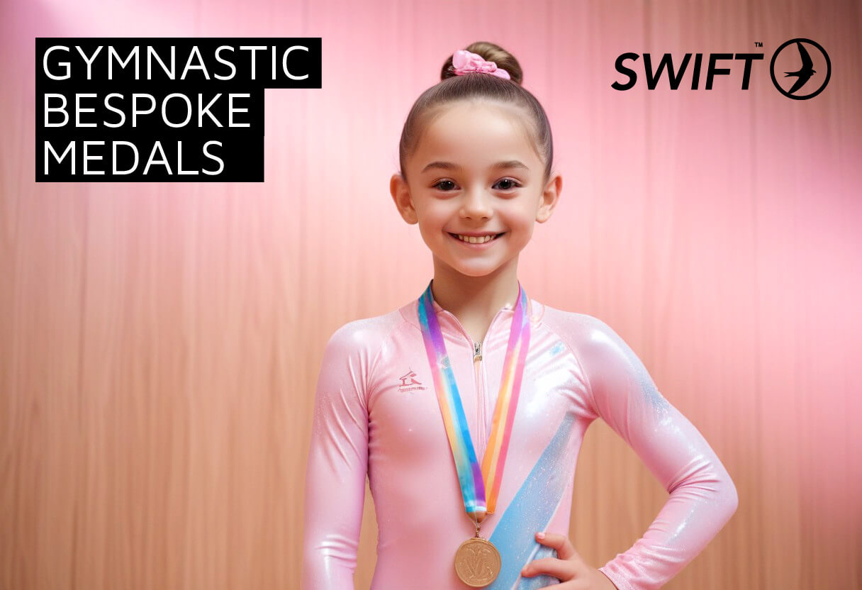 A joyous, accomplished girl child gymnast bedecked with an antique silver medal proudly demonstrating her gymnastic skills. Girl wearing bespoke gymnastic medals from Swift Event Supplies